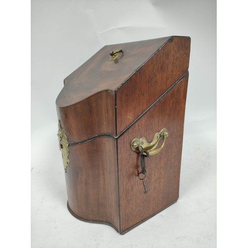 486 - Georgian mahogany knife box with sloping top, the shaped front with elaborate brass lock and hasp, o... 