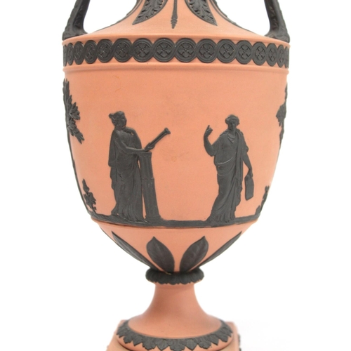 180 - Pair of 20th Century Wedgwood Rosso Antico covered vases of urn form with twin scroll handles, conti... 