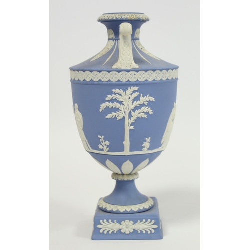 182 - 20th century Wedgwood blue jasperware vase of urn form with twin scroll handles, the continuous frie... 