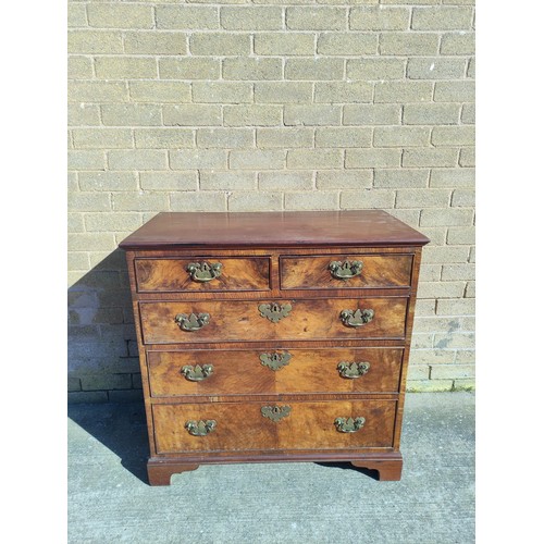 619 - Early/Mid 18th century walnut veneered chest of drawers with swan neck handles raised on bracket fee... 