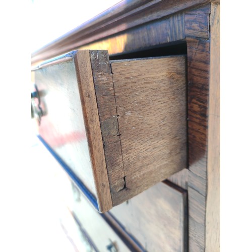 619 - Early/Mid 18th century walnut veneered chest of drawers with swan neck handles raised on bracket fee... 