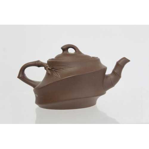 174 - Chinese Yixing pottery teapot of ovoid form, the main body moulded as bamboo cane with similar spout... 