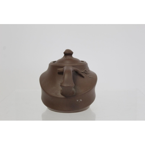 174 - Chinese Yixing pottery teapot of ovoid form, the main body moulded as bamboo cane with similar spout... 