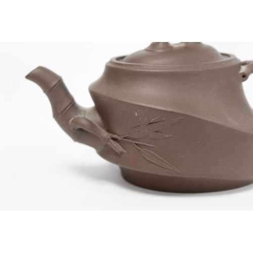 174 - Chinese Yixing pottery teapot of ovoid form, the main body moulded as bamboo cane with similar spout... 