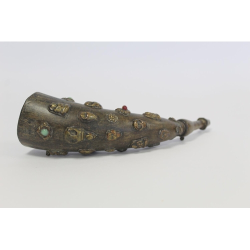 176 - Tibetan horn with carved and shaped end and applied repousse metal masks with inset turquoise and ot... 