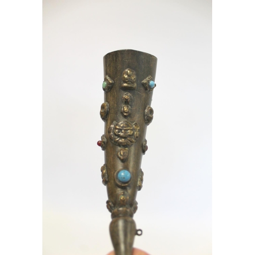 176 - Tibetan horn with carved and shaped end and applied repousse metal masks with inset turquoise and ot... 