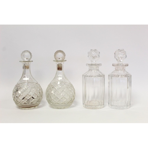 373 - Two pairs of 19th or early 20th century cut glass decanters, each approx. 24.5cm high.  (4).