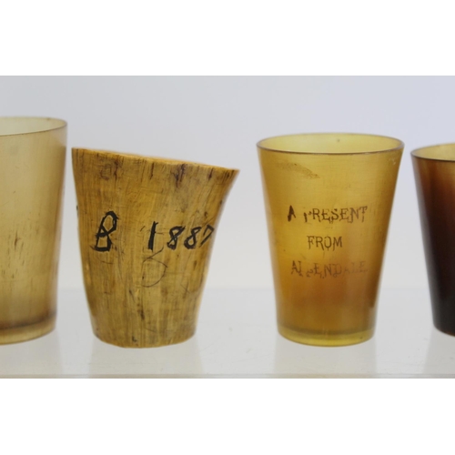 390 - Collection of twenty small horn beakers, one inscribed with date 1887, another 