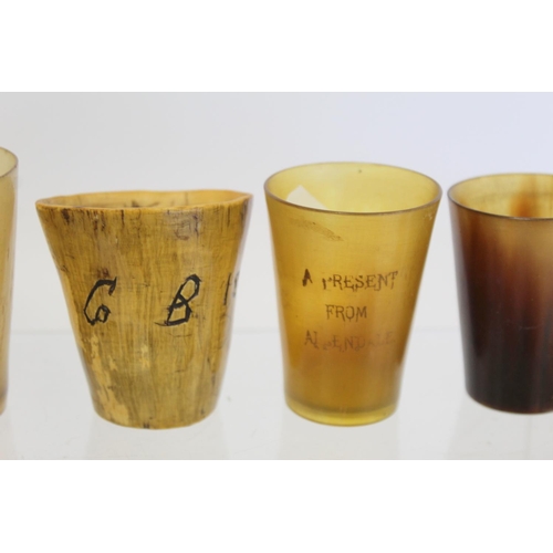 390 - Collection of twenty small horn beakers, one inscribed with date 1887, another 