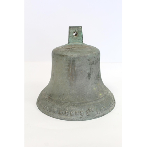 401 - Victorian large bronze bell by J. Warner & Sons Ltd., London, dated 1900, lacking clapper. 28cm ... 