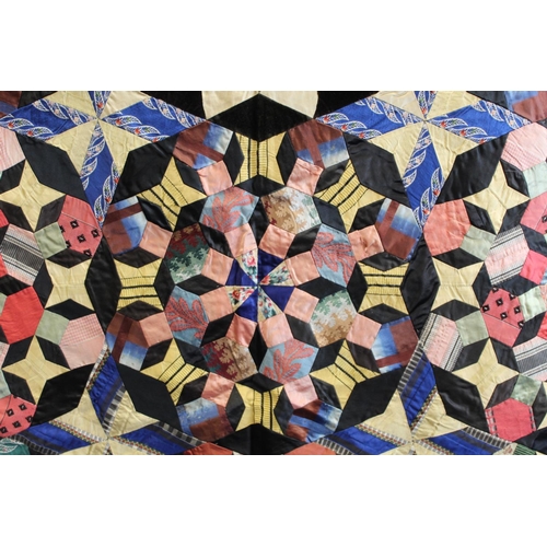 413 - Exceptionally fine and large antique pieced mosaic patchwork quilt, probably American, worked in pol... 