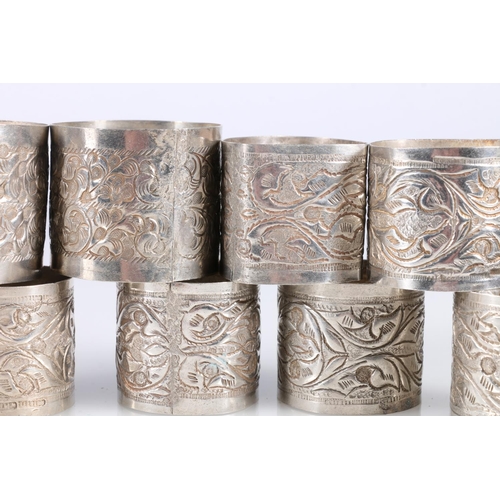 485 - Ten Libyan white metal napkin rings, 202g gross.