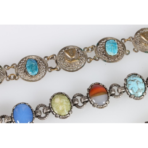 510 - Silver brooch set with three navette shaped cabochon stones, perhaps carnelians, 2.1g, an Egyptian s... 