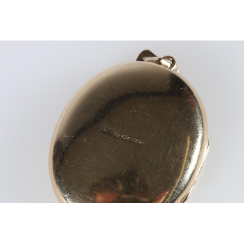 515 - 9ct gold locket with incised floral design, makers mark P J Co., 13.1g gross.