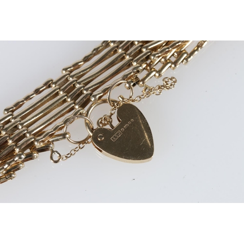 516 - 9ct gold gate bracelet with heart shaped padlock closure, makers marks 'A S J', 12.8g.