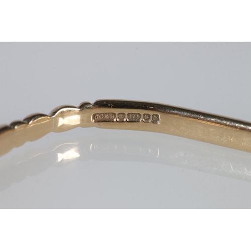 517 - 9ct gold bangle, makers marks 'C C & S', 12.9g.