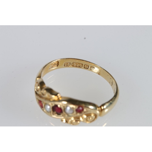 527 - 15ct gold ruby and seed pearl dress ring, 3.1g gross.