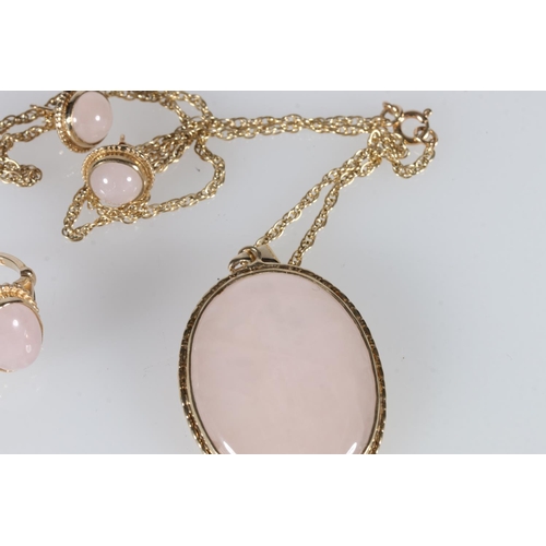 535 - 9ct gold mounted white quartz pendant on 9ct gold chain, also a similar ring and a pair of earrings,... 