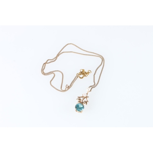 569 - 9ct gold mounted pearl and faceted blue stone pendant by C & F on an unhallmarked fixed chain, 5... 