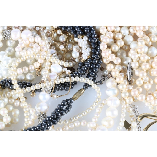 576 - Baroque pearl necklace, a pearl necklace with silver clasp, and other pearl and faux pearl jewellery... 