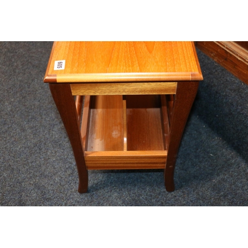 605 - Teak side table over magazine rack, raised on straight supports, 50cm high.