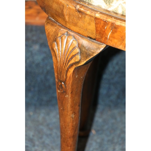 608 - 1920s/30s stool, the oval top on four cabriole supports, with shell knees and terminating in pad fee... 