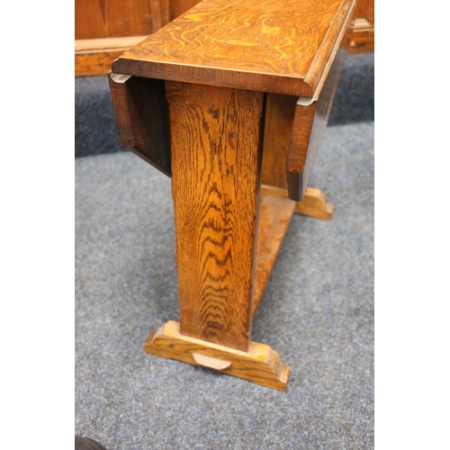 621 - 1930s/40s oak occasional table, with drop-leaf sides and rotating top, 50cm high.