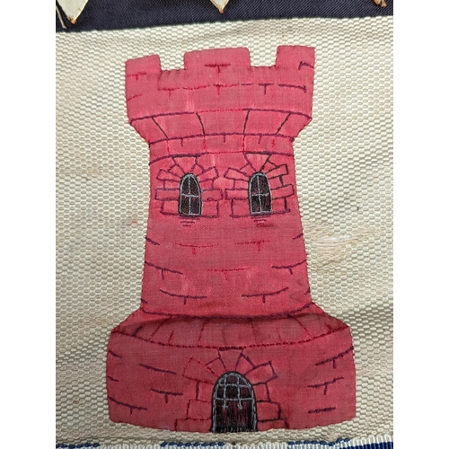 435 - Needlework heraldic banner with castle turret, stars and arrows, 55cm x 46cm.