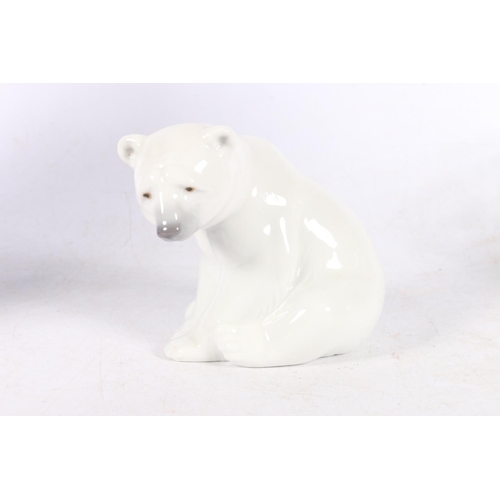 107 - Burleigh Ironstone blue and white decorated jug, a Lladro polar bear model, and a cut-glass fruit bo... 