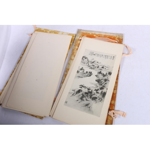 119 - Oriental folder containing prints.