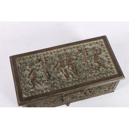 159A - Impressive cast metal hinge-top box, depicting scenes of cherubs dancing amongst scrolls, 17cm wide.