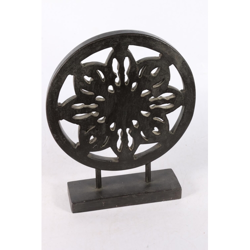 174 - Pierced composite circular sculpture, on plinth base, 29cm high.