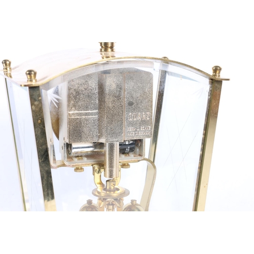 22 - Kern of West Germany brass and four glass anniversary clock of tapering form, 16cm high.