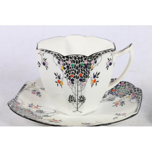 231 - Shelley Art Deco cabinet cup and saucer, a crested tyg, and Queen Victoria's record reign crested sa... 