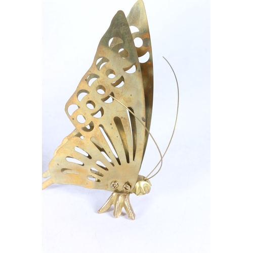 33 - Set of three graduated pierced brass butterfly models, largest 20cn high.