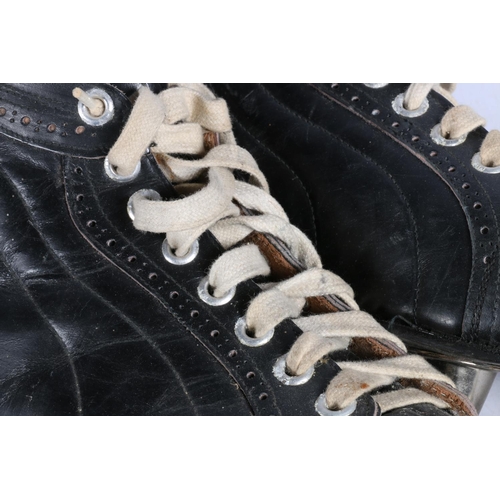 37 - Pair of vintage maple leaf ice skates.