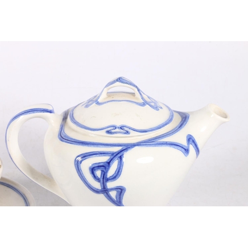 39 - Villeroy & Boch Art Nouveau style teapot, 14cm high, cup and saucer, white glaze decorated with ... 