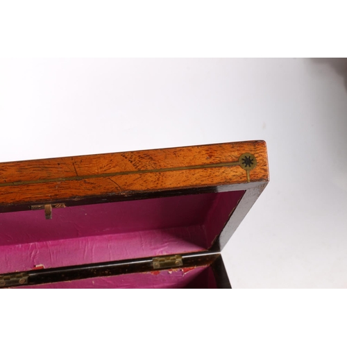 4 - Rosewood brass marquetry inlaid hinge top box of sarcophagus form, raised on bun feet, 23cm wide.