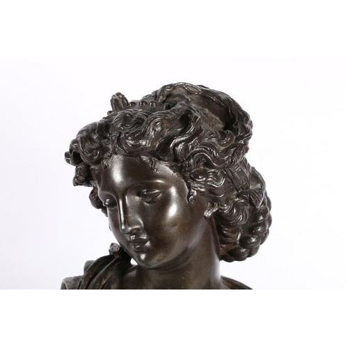 77 - Spelter bust of a classical female, 30cm high.