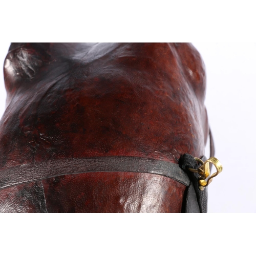 8 - Leather covered model of a horse, 43cm long.