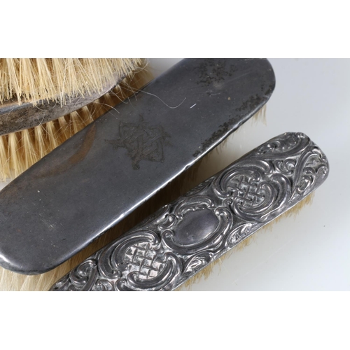 471 - George V  pair of brushes with silver backs by C C (?), Chester 1911, along with two other silver ba... 