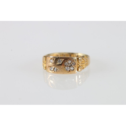 554 - 15ct gold dress ring set with small diamonds, 2.36g.