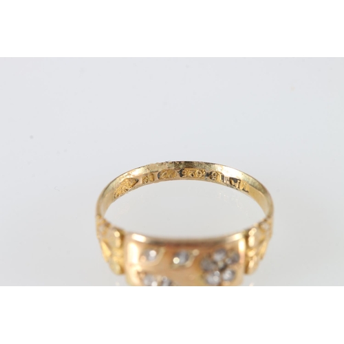 554 - 15ct gold dress ring set with small diamonds, 2.36g.