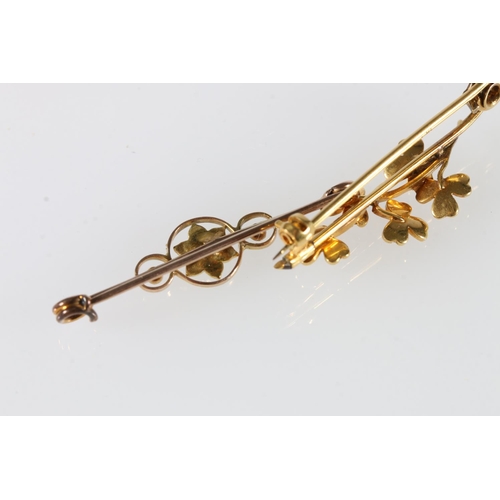 562 - Two 9ct gold brooches set with seed pearls, 4.6g gross.