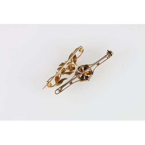 563 - Two 15ct gold brooches set with seed pearls, 6.74g gross.