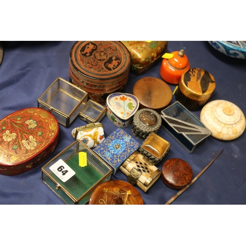 64 - Lacquered, white metal, and straw work trinket boxes.