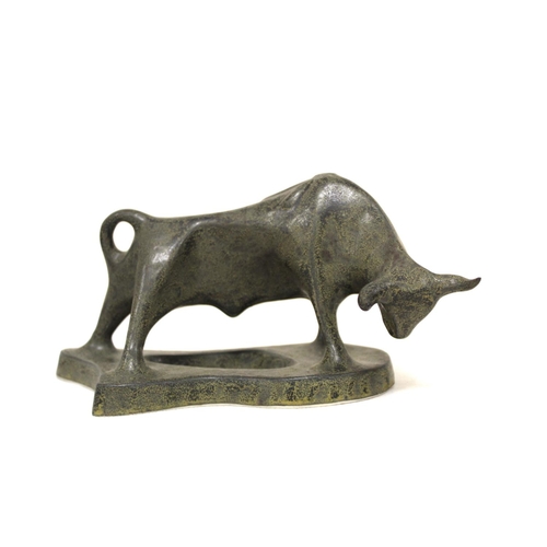 468 - Three Art Deco style pottery figures of a bull, 12cm high; an eagle, 19cm high and an elephant, 21cm... 