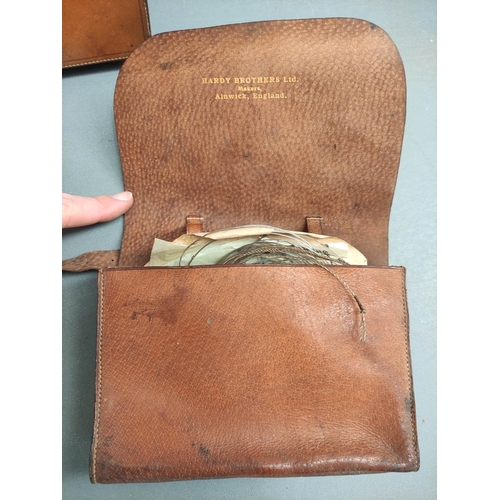 544 - Angling. Two early 20th century C A Hardy Bros Alnwick leather casting wallets and contents to inclu... 