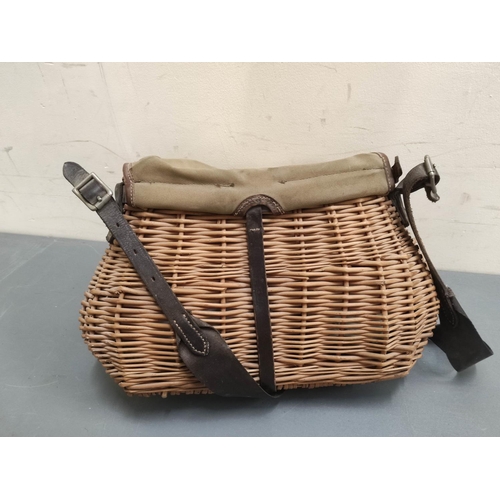 Angling. Wicker and canvas fishing creel and contents to include