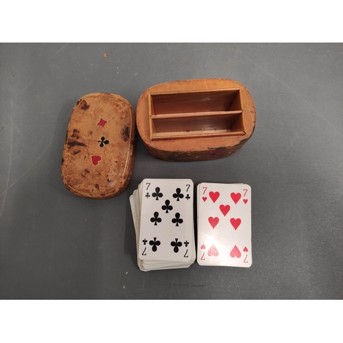 555 - Vintage gambling collectables to include a French 1920's Jost & Cie dealers card shoe, leather c... 